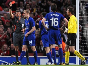 Fletcher is shown the red card that has ruled him out of the Champions League final against Barcelona.