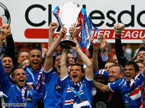 Rangers celebrate winning the Scottish title  after three seasons of Celtic dominance.