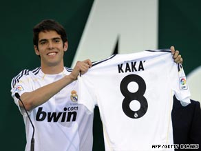 Kaka parades his new Real Madrid jersey after completing his $92 million transfer to the Spanish giants.