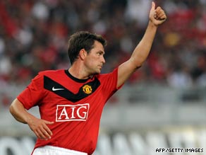 Michael Owen celebrates his winning goal on debut for Manchester United against a Malaysia XI.