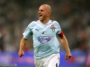 Rocchi celebrates his superb second goal for Lazio in the Bird's Nest.