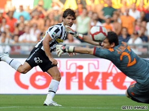 Juventus hero Diego gives Roma goalkeeper Julio Sergio no chance with one of his two goals.