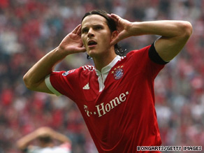 Belgian defender Daniel Van Buyten celebrates his winning goal for Bayern Munich.