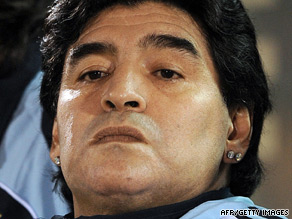 Diego Maradona sports expensive-looking earrings during a recent football match.