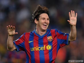 Lionel Messi celebrates his goal as holder Barcelona beat Dynamo Kiev 2-0 at the Nou Camp.