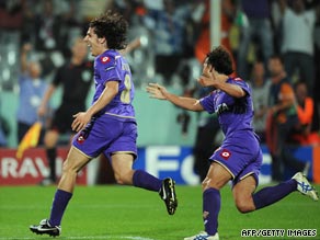 Stefan Jovetic (left) celebrates his opening goal as Fiorentina beat Liverpool 2-0 in Group E.