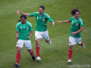 Francisco Palencia (left) celebrates his goal as Mexico secured their place in the finals.