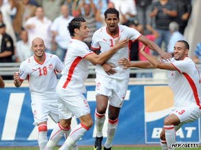 Tunisia's players celebrate Jomaa's first minute goal in the 1-0 win over Kenya.