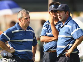 Olazabal (right) is deep in conversation with McGinley on the first day of the Royal Trophy.