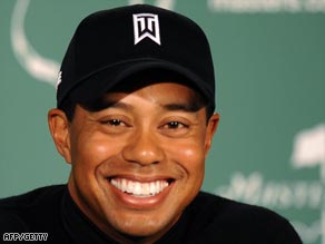 Woods is all smiles as he contemplates a fifth Masters green jacket.