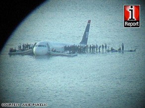 iReporter Julie Pukelis used a camera and a telescope to get this view of the scene in Hudson River.