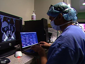 A doctor posts updates on social-networking site Twitter during a recent operation in Detroit.