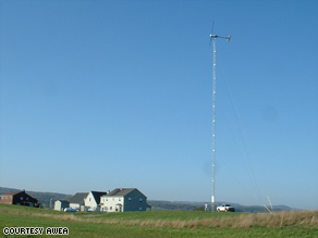 This 10-kilowatt, 120-foot-tall small wind turbine could fulfill the electricity needs of this household.