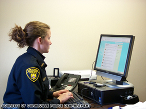 Community Relations Officer Meleah Droll updates the Coralville Police Department's Twitter account.