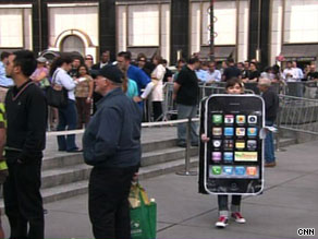 This woman in an iPhone costume was among the crowd  outside an Apple Store in New York City on Friday.