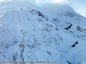 Dark areas show a mudflow from the peak of Mount Redoubt earlier this week.