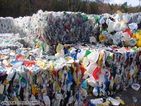 Lynn Heinisch takes her recyclables to a dropoff center miles away because she's unhappy with city services.