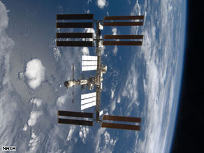 NASA says debris won't threaten the international space station, seen here from Endeavour in November 2008.