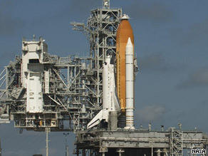 Discovery rests on launch pad 39A at Cape Canaveral on Monday evening.