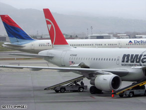 Just weeks after Northwest began handing out peanuts as flight snacks, customers have raised allergy concerns.