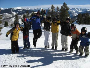 SOS participants celebrate at the top of Vail Mountain, as they complete their five-day program.