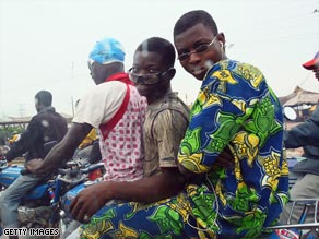 Locals get about in traffic heavy Lagos on motorcycles, known locally as okadas.