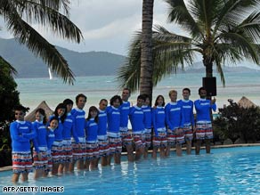The 16 finalists for caretaking an island are shown on Sunday arriving at Hamilton Island.