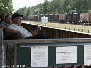 Folkston, Georgia, built a viewing platform in 2001 with a scanner to alert railfans for oncoming trains.