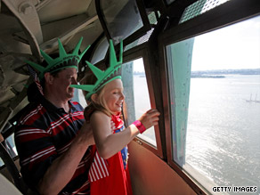 Tourists head into the Statue of Liberty on Saturday.