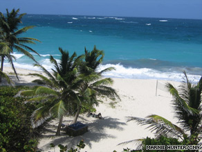 Cherry Tree Hill offers a panoramic view of the island's rugged "Scotland District" and the eastern shoreline.