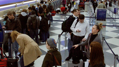 Holiday travelers brave airports, roads