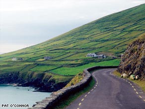 Dingle's main street welcomes visitors with brightly painted shops and pubs.
