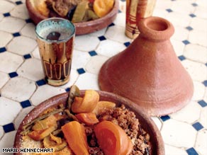 The Traiteur Marocain stall at the Marche des Enfants Rouges offers traditional Moroccan couscous dishes.