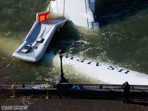 The disabled Airbus A320 is nearly submerged Friday as it is moored near New York's Battery Park City.