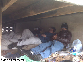 The men's under-porch shelter was just feet from a street in Plainfield, New Jersey.