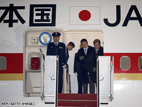 Japanese Prime Minister Taro Aso steps off his Boeing 747 at Andrews Air Force Base in Maryland Monday.