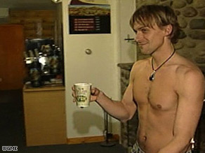 Male and female servers go topless at Grand View Topless Coffee Shop.