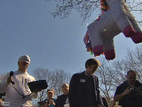 A pinata is about to be smashed at the "Unemployment Olympics" in New York City on Tuesday.