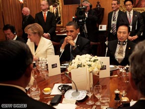 President Obama is discussing the global economic crisis with other world leaders at the G-20 summit this week.