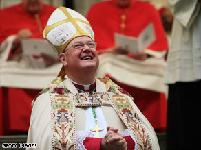 Archbishop Timothy Dolan looks to the sky during an evening prayer service Tuesday in New York.