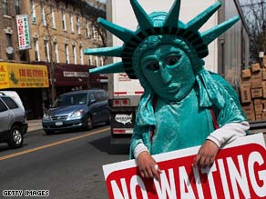 Liberty Tax Service co-owner Susie Vargas works on returns at her office in New York.