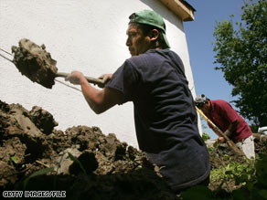 Migrant laborers help in the post-Hurricane Katrina cleanup in New Orleans, Louisiana, in 2006.