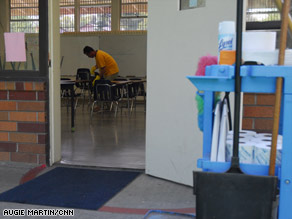 John Garcia disinfects a classroom at St. Mel Catholic School in Fair Oaks, California.