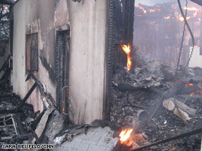 Fires rage Thursday through a Santa Barbara neighborhood, leaving a swath of destruction.