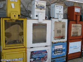 Newspaper vending boxes feel economy s slide CNN