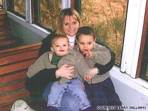 Terry Williams hugs her two boys -- Jake, left, and Zack -- in 2006, before she says toxic cabin air made her sick.