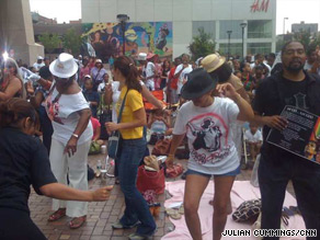 Michael Jackson fans watch Tuesday's memorial service in Raleigh, North Carolina.