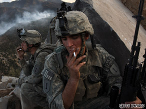 Defense Secretary Robert Gates says he does not want to compound stress in combat zones by banning smoking.