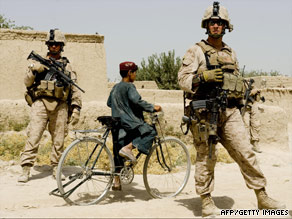 U.S. Marines partrol part of the Gharmsir district in Afghanistan's Helmand province on Wednesday.
