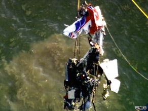 The wreckage of a plane that collided with a helicopter is lifted this week from the Hudson River.